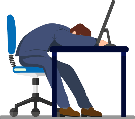 スーツを着た男性が机に伏せて悩んでいる様子